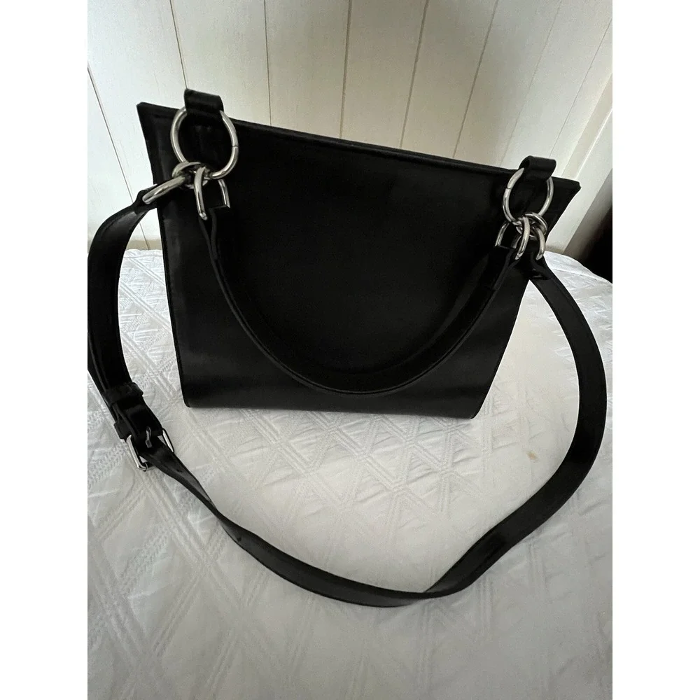 Steve Madden bag, sizes 10 × 8 with adjustable‎ strap,,black